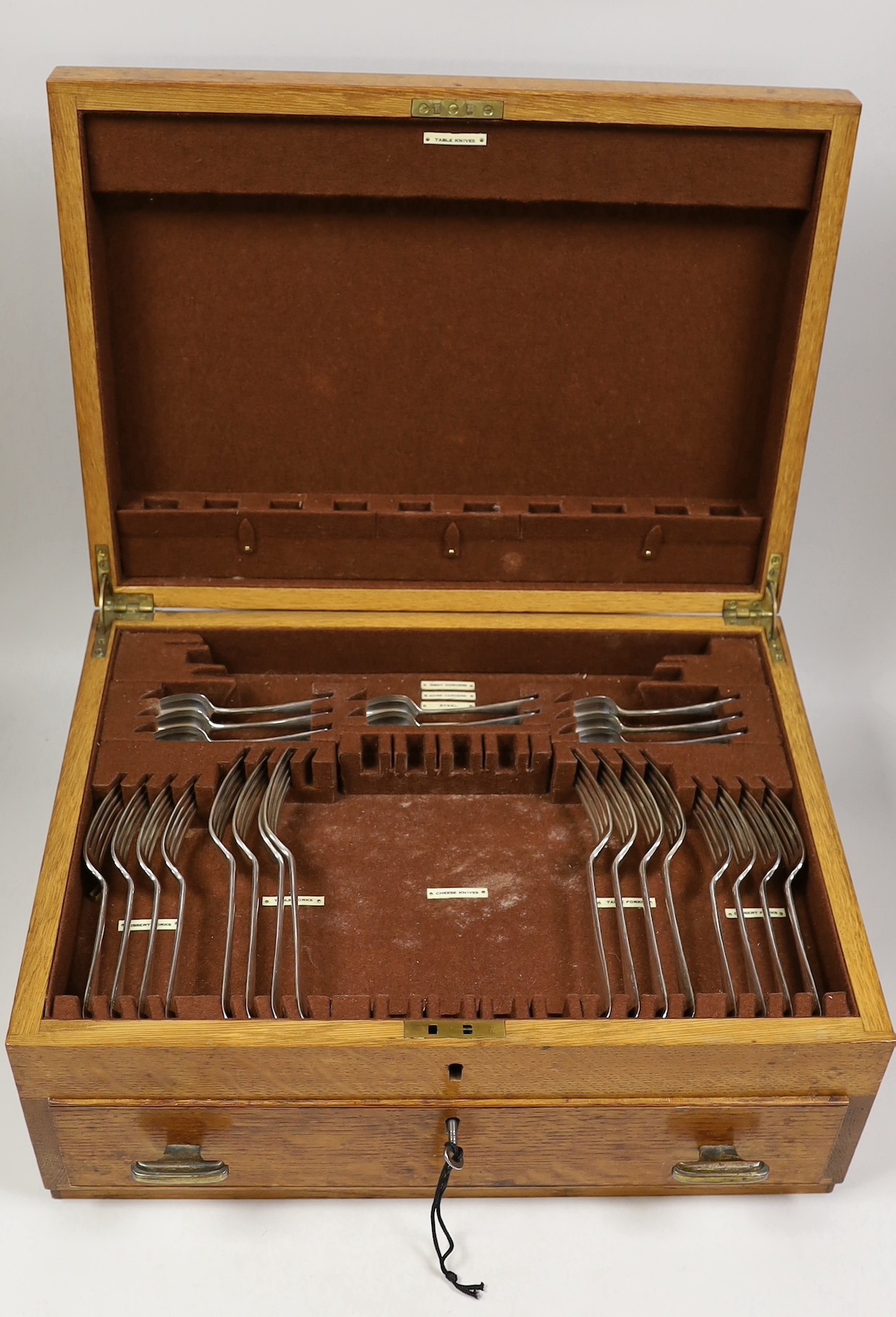 A matched part canteen of George V silver Hanovarian pattern flatware, comprising fifty four items, mostly Josiah Williams & Co, London, 1935